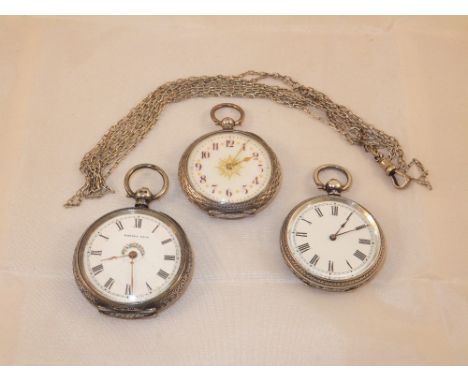 Three Continental silver cased ladies pocket watches, the white enamel dials set with Roman or Arabic numerals, one inscribed