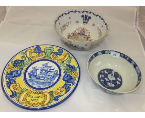 A Chinese porcelain bowl decorated with prunus blossom and bearing character marks to base, together with a 20th Century Chin