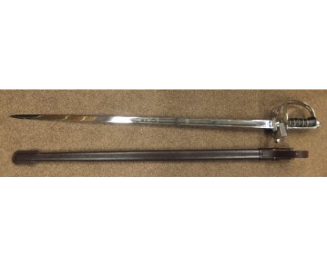 An 1854 pattern Welsh Guards officer's sword by Wilkinson, in leather scabbard CONDITION REPORTS Blade length approx 81.5cm. 