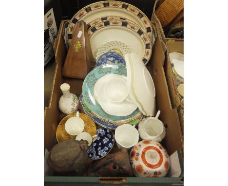 A box of assorted china wares to include decorative plates, etc, together with a mahogany cased metronome , bearing label ins