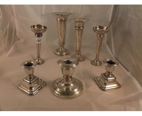 A pair of silver trumpet stem vases (Birmingham, 1982), together with two larger similar vases, a pair of George V silver squ