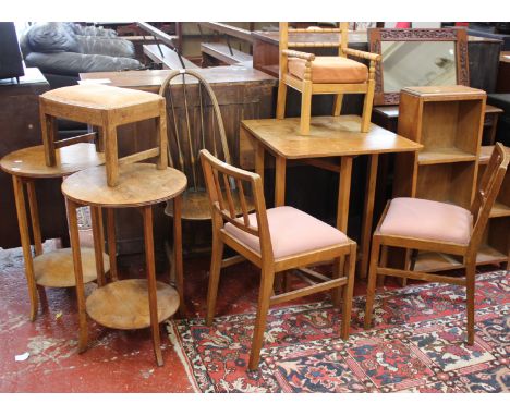A pair of oak two tier lamp tables, drop leaf table, two oak bookcases, mirror and three chairs and a childs chair 
