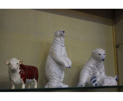 Two Royal Copenhagen polar bears and a Beswick cow (3)