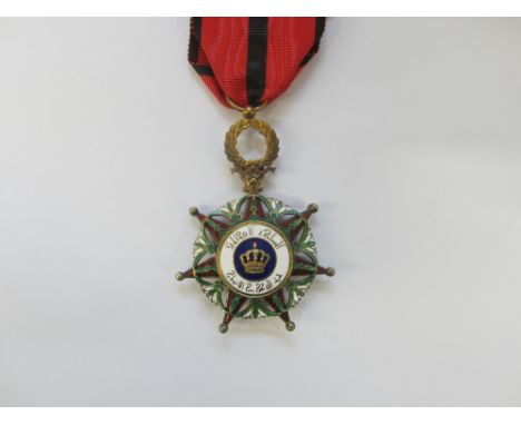 Iraq,Order of Al Rafidian, Knight's breast badge in gilt and enamel. Good very fine. (1)For further information on this lot p