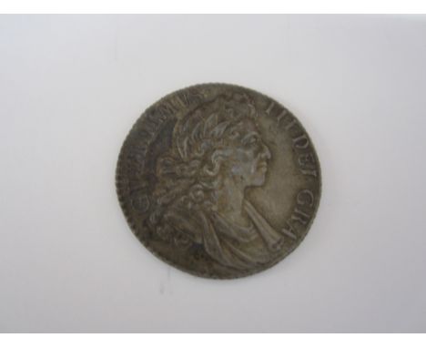 William III,Shilling, 1700, fifth draped bust right, R.Crowned cruciform shields, angles plain (S.3516).  Lightly toned, good