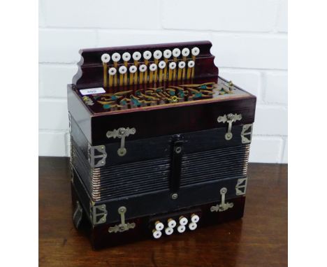 A stained wood accordion 