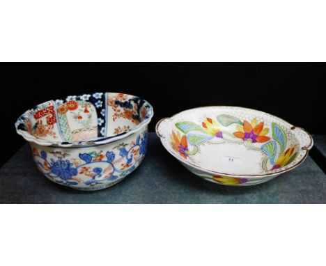 A Chinese 'Imari' patterned bowl (with chips to rim), together with a Thomas Bavarian porcelain hand painted bowl, signed B. 