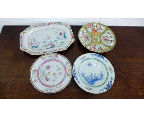 A group of four Chinese Famille Rose porcelain plates comprising an octagonal meat dish painted with fisherman, a Famille Ros