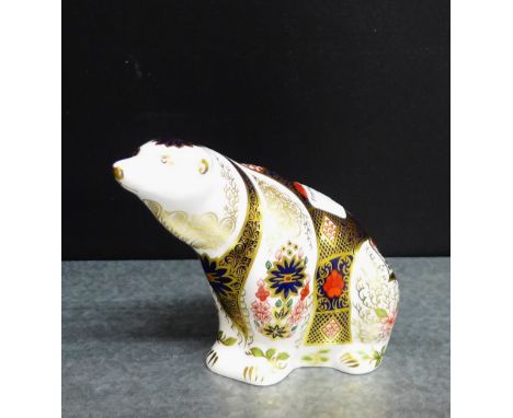 A Royal Crown Derby 'Imari' patterned porcelain Polar Bear paperweight with gold stopper, 11cm high