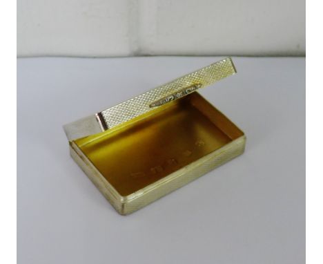 Contemporary silver gilt box and cover of rectangular form with engine turned decoration, bearing makers marks for Peter John