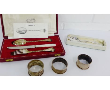 A cased set of James II style silver flatware to include a spoon, fork and mother of pearl handled knife, hallmarks for Sheff