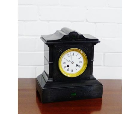 A black slate mantle clock, the enamel dial with Roman numerals, 30 x 27cm