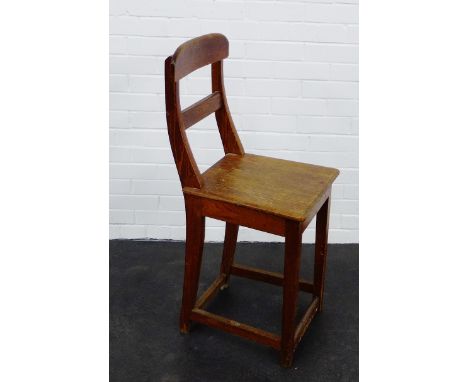 An oak high backed seat /  stool 