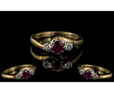 Ladies Attractive 9ct Gold Ruby and Diamond Set Ring. Full Hallmark for 9.375. The Faceted Ruby of Good Colour. Ring Size N -