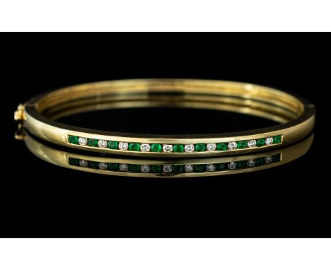 18ct Gold - Good Quality and Attractive Emerald and Diamond Set Hinged Bangle of Pleasing Design / Proportions. Full Hallmark