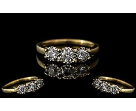 Ladies 9ct Gold Attractive 3 Stone Diamond Set Ring. Full Hallmark to Interior of Shank. The Round Modern Brilliant Cut Diamo