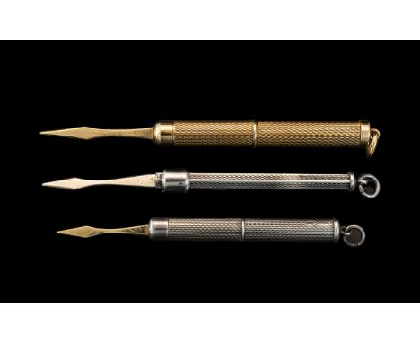 A Fine Quality 9ct Gold Telescopic Toothpick, Engine Turned Case. Hallmark London 1978. Weight 6.5 grams + A Sterling Silver 