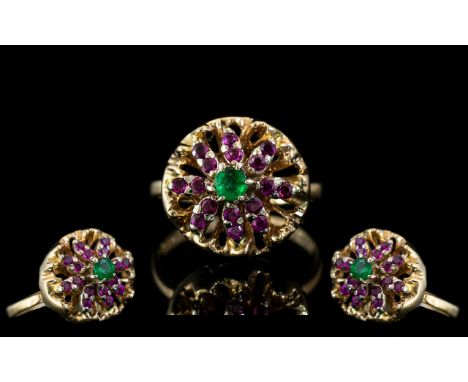 Ladies Attractive 14ct Gold Ruby and Emerald Set Cluster Ring. The Central Emerald Surrounded by a Cluster of Rubies In a Flo