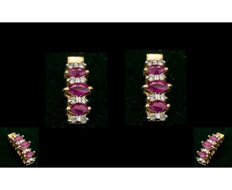 14ct Gold - Attractive Pair of RUby and Diamond Set Drop Earrings. Marked 14ct. Rubies and Diamonds of Good Colour / Clarity.