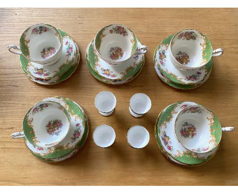 A Paragon Rockingham Design Part Teaset comprising 4 egg cups, 5 tea cups, 5 saucers, and 6 cake plates