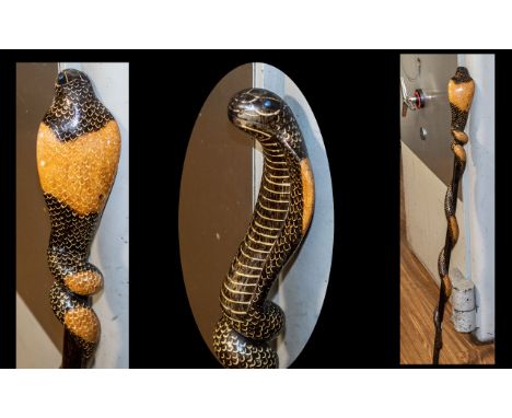 Decorative Snake Walking Cane, hand carved Cobra decorative stick decorated with a snakes head and body entwined along the le