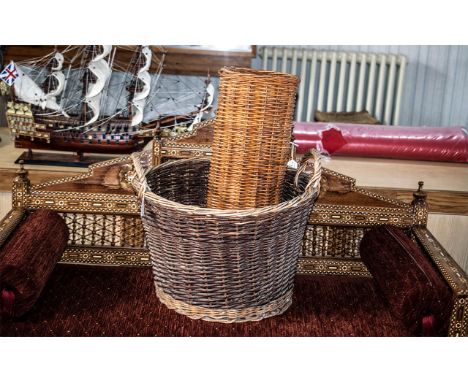 Large Wicker Log Basket, measures 14" high x 20" wide, twin handles, together with a 24" tall wicker stick stand, and two bra