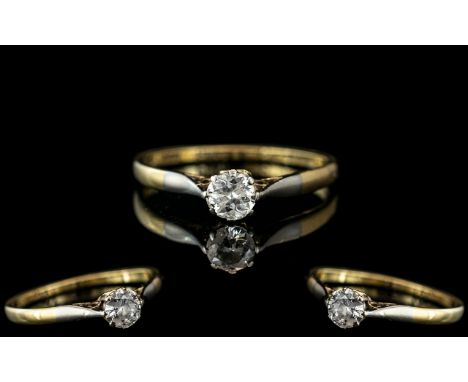 18ct Gold And Platinum Single Stone Diamond Ring, Marked 18ct and Platinum to Interior of Shank, Platinum Shoulders. The Roun