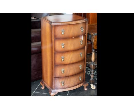 Small Chest of Five Drawers, with decorative pull handles.  Raised on four ball feet.  Measures 18" wide x 13.5" deep x 36" t