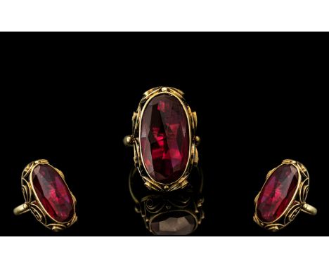 A Superb 14ct Gold Single Ruby Coloured Stone Set Dress Ring of Pleasing Proportions, With Wonderful Ornate Shank. Marked 585