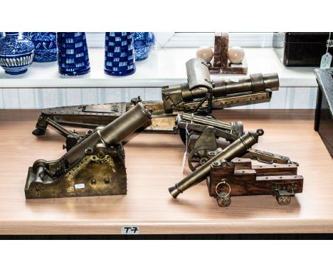 Collection of Detailed Scratch Built Model Cannons, by Jack and Jim Bird, together with a photograph of the Birds with the mo