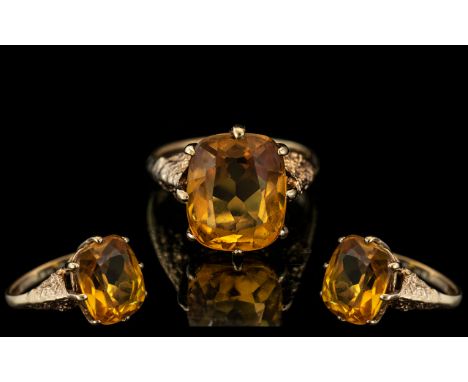 Ladies - Attractive 9ct Gold Good Quality Single Stone Citrine Set Ring. The Faceted Citrine of Deep Yellow / Orange Colour, 