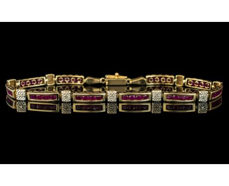 Ladies - Attractive 14ct Gold Ruby and Diamond Set Bracelet. Marked 14ct - 585. Rubies and Diamonds of Good Colour. Weight 6.