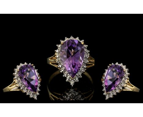 Ladies 9ct Gold Attractive Diamond and Amethyst Set Ring. Full Hallmark for 9.375. The Pear Shaped Amethyst of Excellent Colo