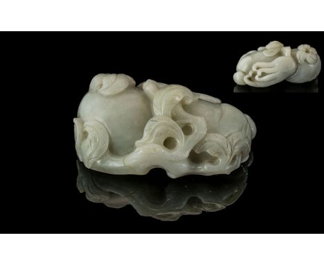 A Large Piece of White Jade in the form of an octupus of typical flora and good colour. Measures 4 inches wide.
