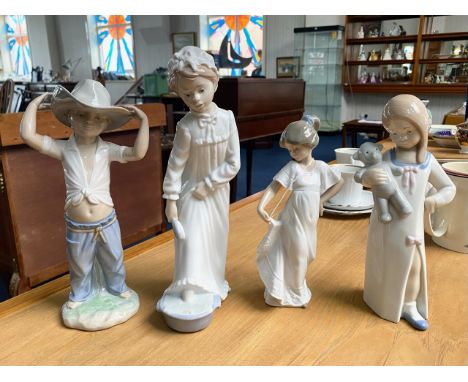 A Collection of Nao by Lladro Figures (3) in total. Comprises a boy with cowboy hat on, a girl in nightdress and one other. P