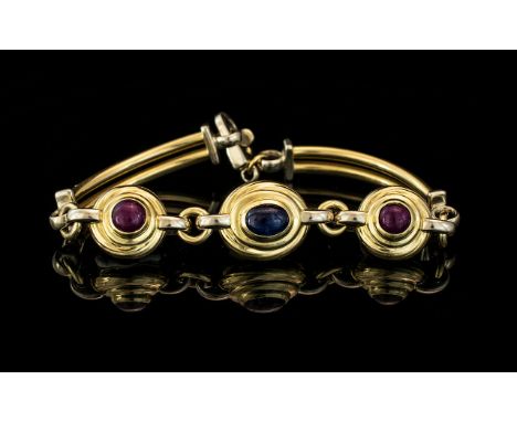 Ladies 14ct Gold Good Quality Ruby &amp; Sapphire Set Bracelet marked 585 - 14 ct.  The pave set cabochon cut rubies and sapp