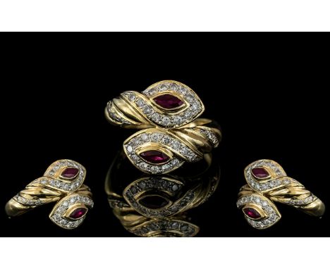 A Superb 18ct Gold Double Headed Snake Ring, Set with Diamond to Head with Ruby Set Eyes. Marked 750 - 18ct to Interior of Sh