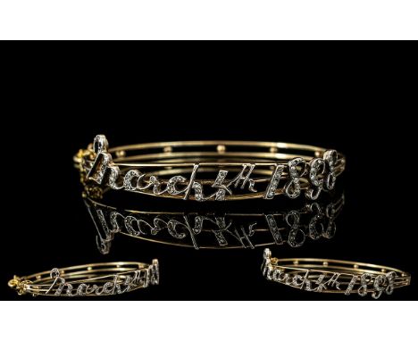 Victorian Period Good Quality 9ct Gold Pleasing Diamond Set Hinged Bangle, with 9ct gold safety chain.  The words 'March 4th 