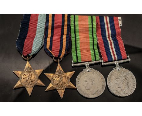 WW II Military Set of 4 Medals with Ribbons not named comprises 1. 1939-1945 Star 2. Burma Star 3. 1939-1945 Service medal 4.