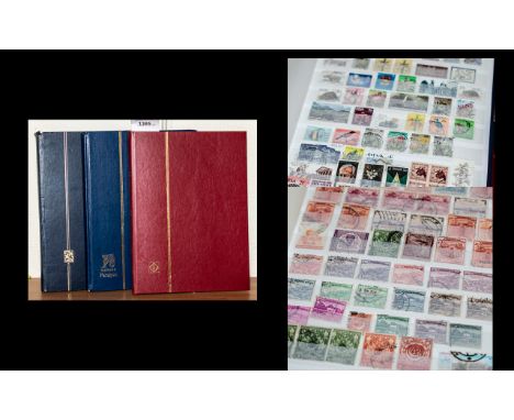Stamp Interest - Three Stamp Albums containing First Day Covers of Butterflies, Endangered Species, Famous Trains, and Comedi