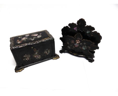 A VICTORIAN PAPIER MACHE TEA CADDY  typically decorated with painted flowers and inlaid mother of pearl, the twin sectioned i