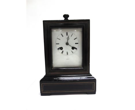 A FRENCH 8-DAY MANTLE CLOCK  the enamel dial with Roman numerals inscribed 'HY MARC PARIS', in ebonised wooden case with bras