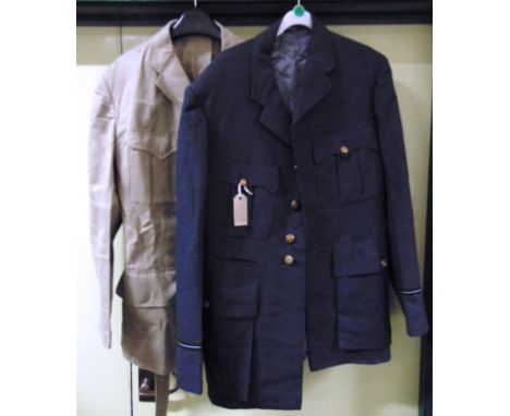 MILITARIA - A ROYAL AIR FORCE UNIFORM  circa 1950s, including an officer's tunic and trousers; great coat; tropical tunic; ba