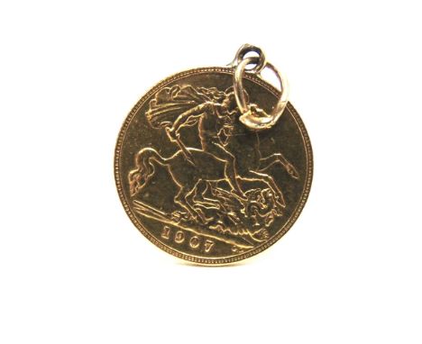 A 1907 HALF SOVEREIGN  with a soldered ring, 4.1g gross