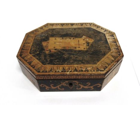 A PEN WORK GAMING BOX  early 19th century of eight sided construction, the hinged lid and box sides decorated with playing ca
