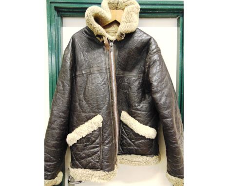 AN IRVIN TYPE SHEEPSKIN FLYING JACKET  of typical pattern lacking belt, not labelled