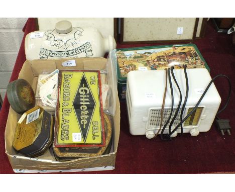 A ceramic 'Doulton's Improved Foot Warmer', a small Alba white Bakelite-cased radio, 20cm wide, 13cm high, a glass advertisin