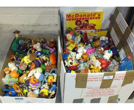 A collection of over 200 McDonald's plastic collectibles and a 'The Definitive Guide' book by Ray and Ruby Richardson, David 