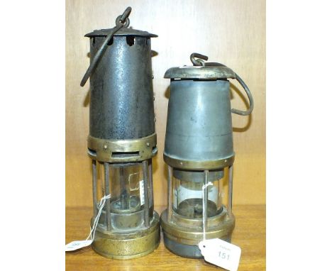 A Mueseler-type miner's lamp by William Teale, Manchester, (name plate missing), 27cm high and a Wolf Safety Lamp Co. Wolf-ty