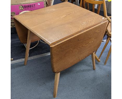 A mid 20th century Ercol blonde elm and beech model 383 drop leaf dining table, 71.5cm h x 75cm wLocation:If there is no cond